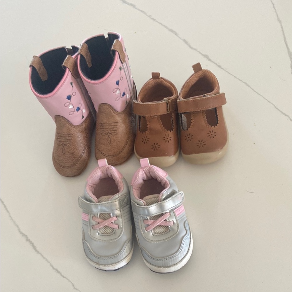 Three pair of baby girl size 3 and 3.5 shoes.